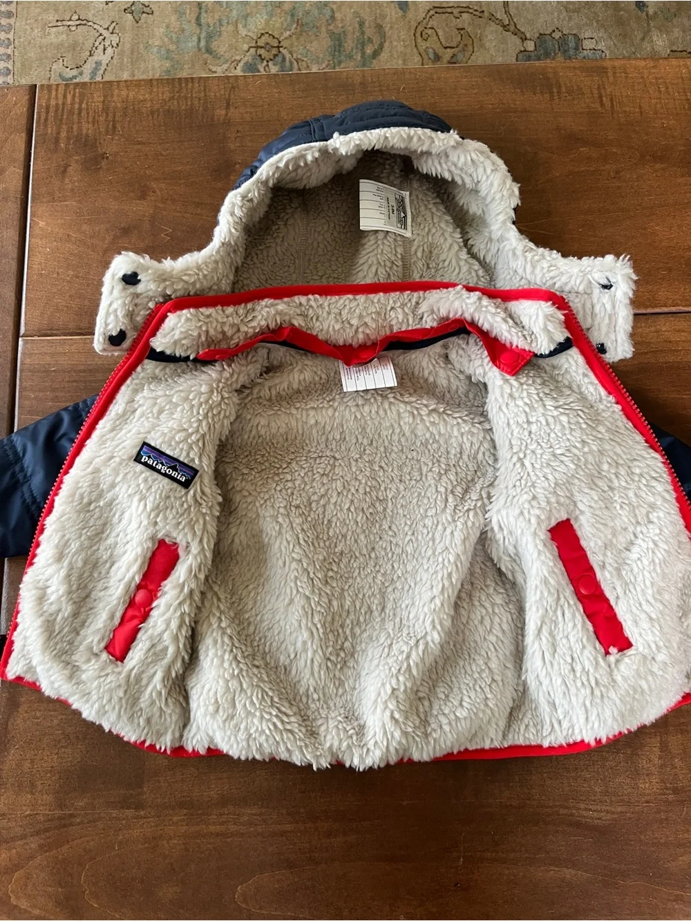 Patagonia Navy Infant Hooded Puffer Jacket with Red Accents